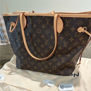 Only used twice Neverfull MM. does not come with pochette!!